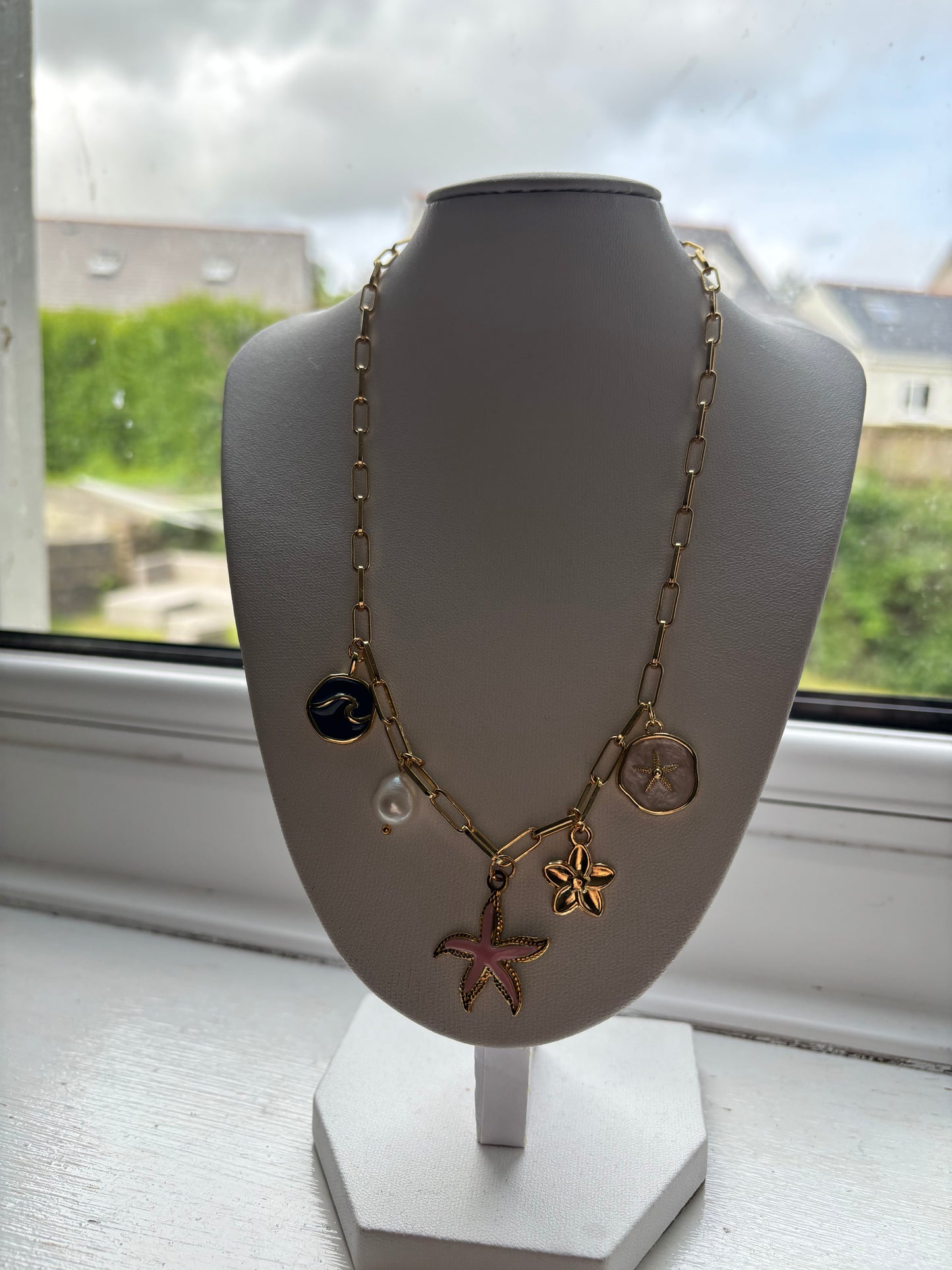 Gold charm necklace
